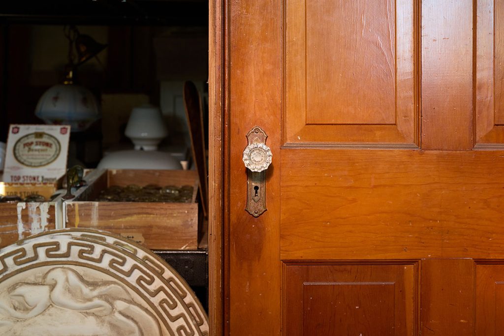 Restored vintage wooden door highlighting durability of reclaimed materials